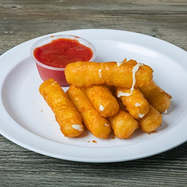 Golden-brown mozzarella sticks with melted cheese oozing out, served with a side of red dipping sauce.