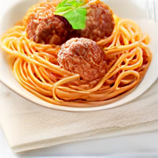 Spaghetti and your choice of meatballs, sausage or veggies